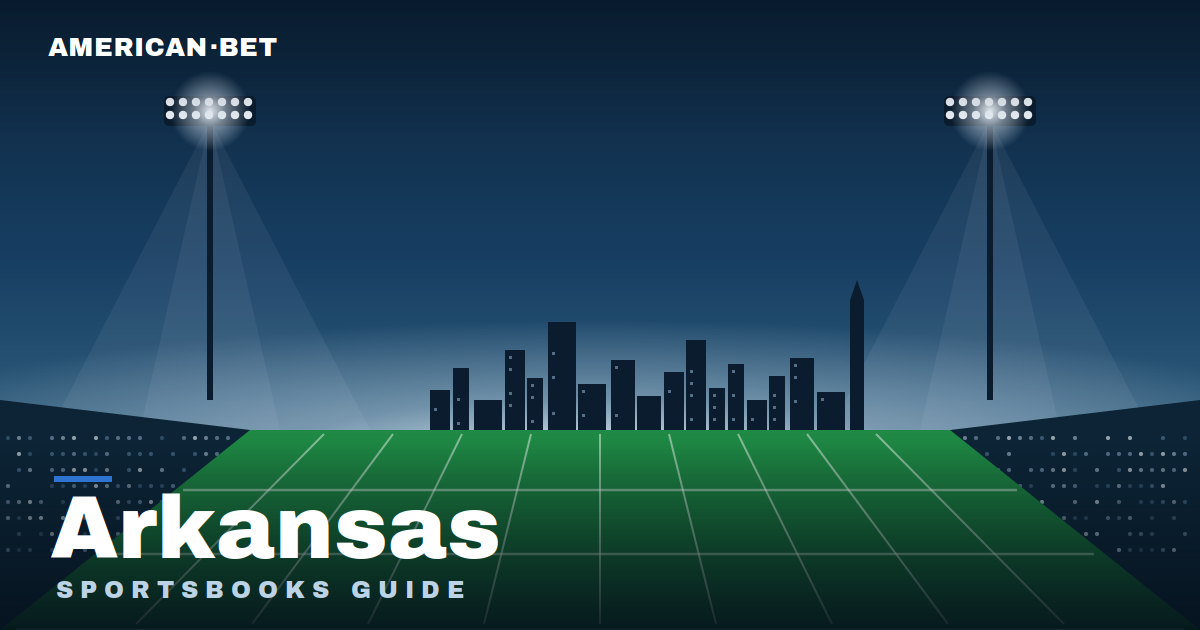 Floodlit stadium at dusk with the Arkansas skyline — American Bet's guide to the best Arkansas sportsbooks, betting apps and promos.
