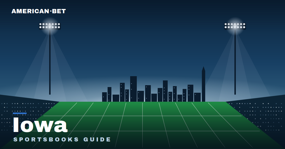 Floodlit stadium at dusk with the Iowa skyline — American Bet's guide to the best Iowa sportsbooks, betting apps and promos.
